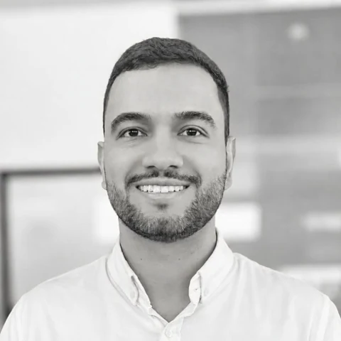 Black-and-white portrait of Samuel Rodriguez, founder of Susam Partners.